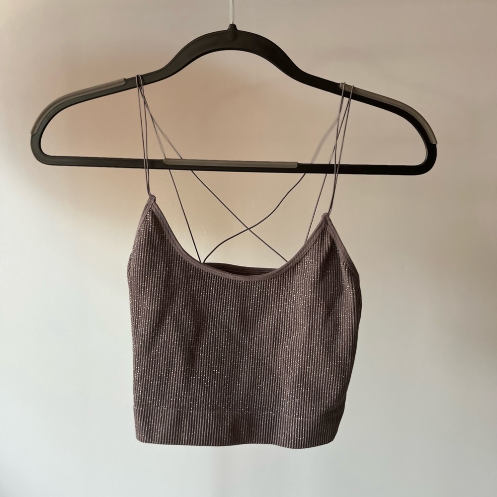 Medium out from under sparkly tank top
